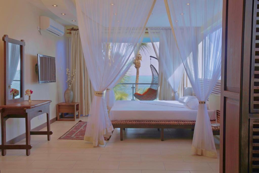 Cowrie Shell Beach Apartments Official Bamburi Quarto foto